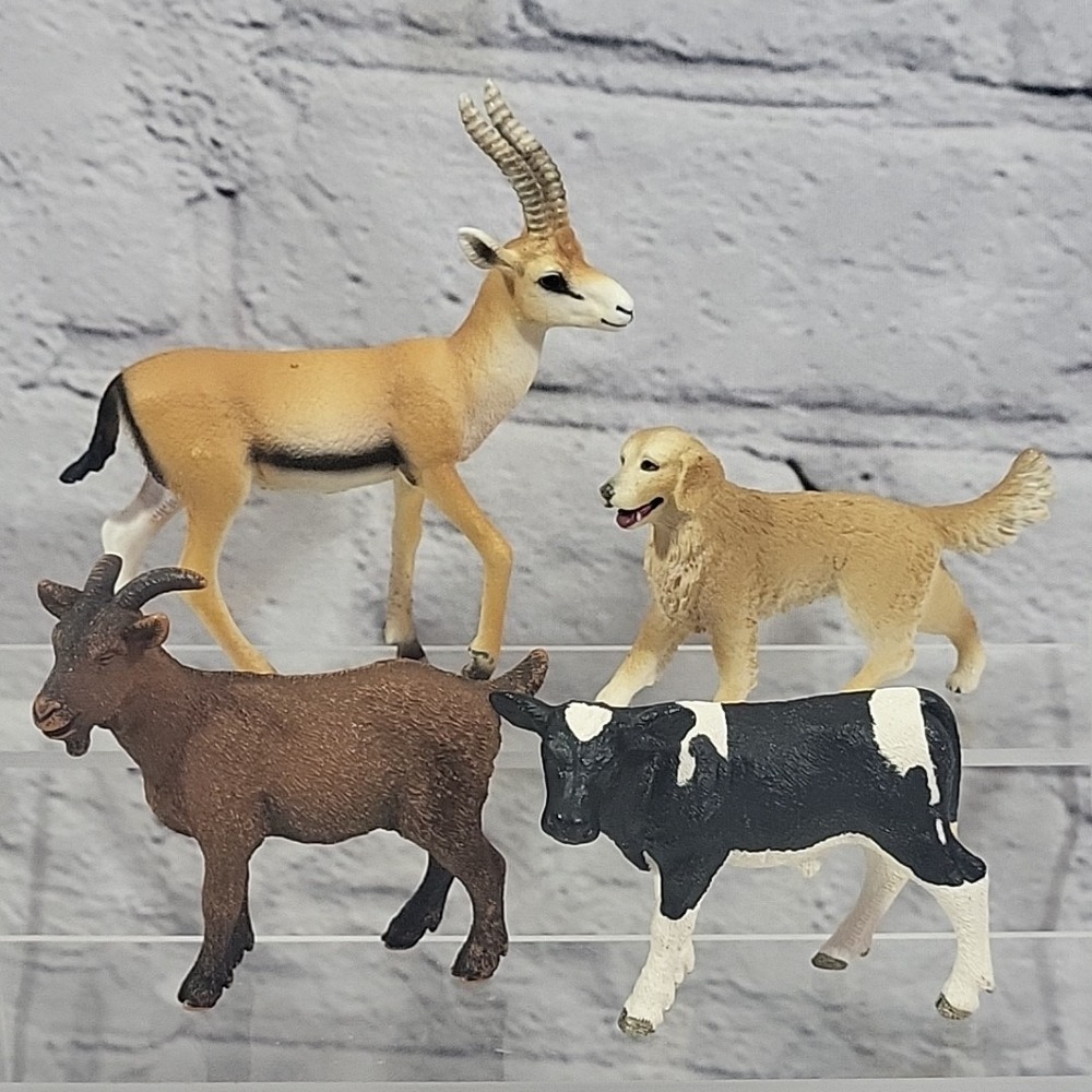 Schleich Animal Figures Lot Of 4 Ram Goat Golden Retriever Dog Cow Calf Gazelle